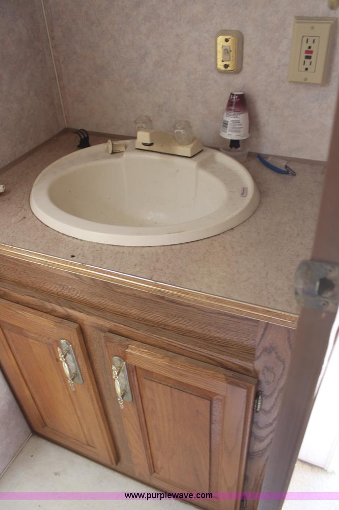 image for item H1419 1994 Fleetwood Savanna camper