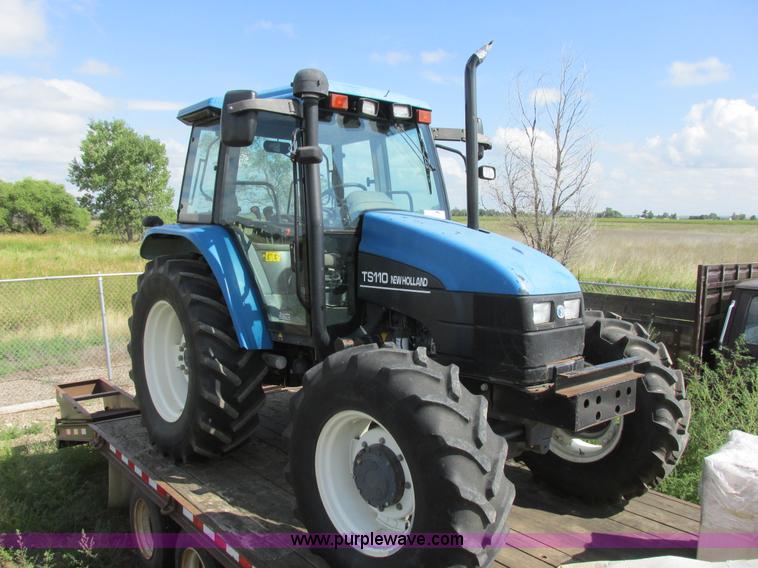 image for item I6197 1999 New Holland TS110 MFWD tractor