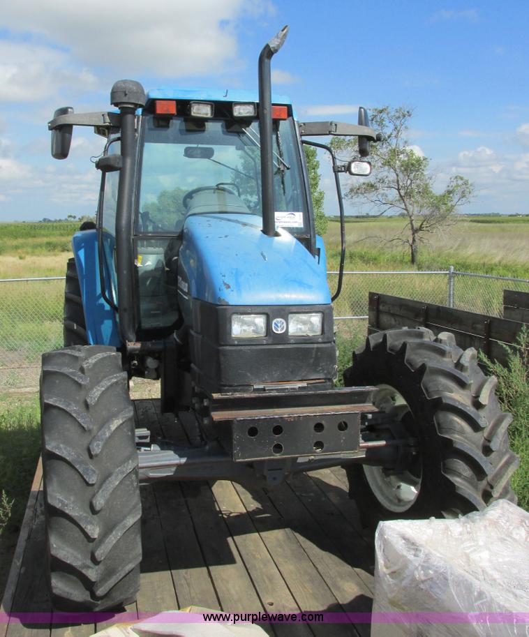 image for item I6197 1999 New Holland TS110 MFWD tractor