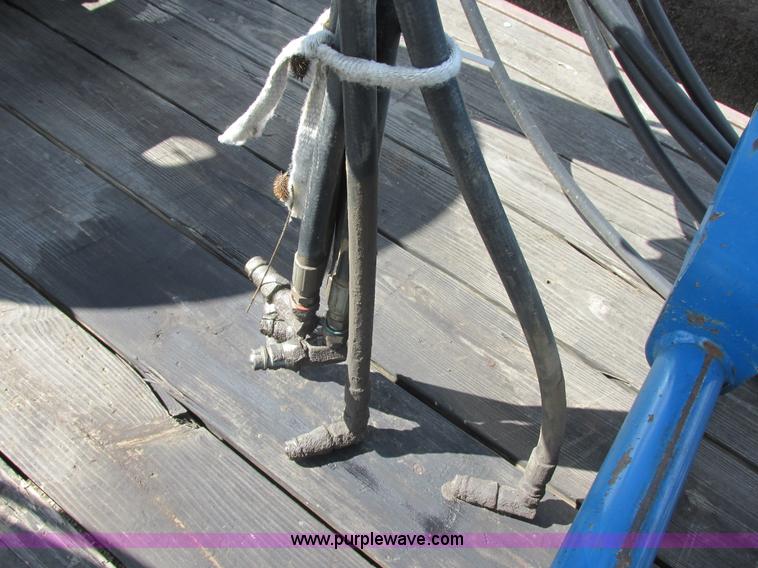 image for item I6197 1999 New Holland TS110 MFWD tractor