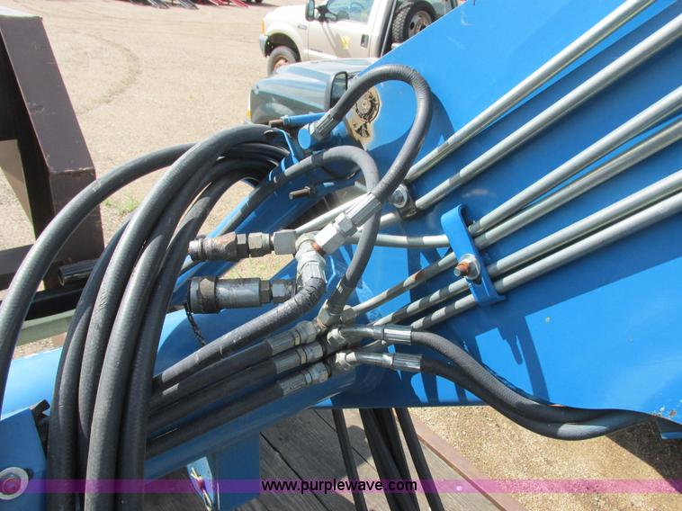 image for item I6197 1999 New Holland TS110 MFWD tractor