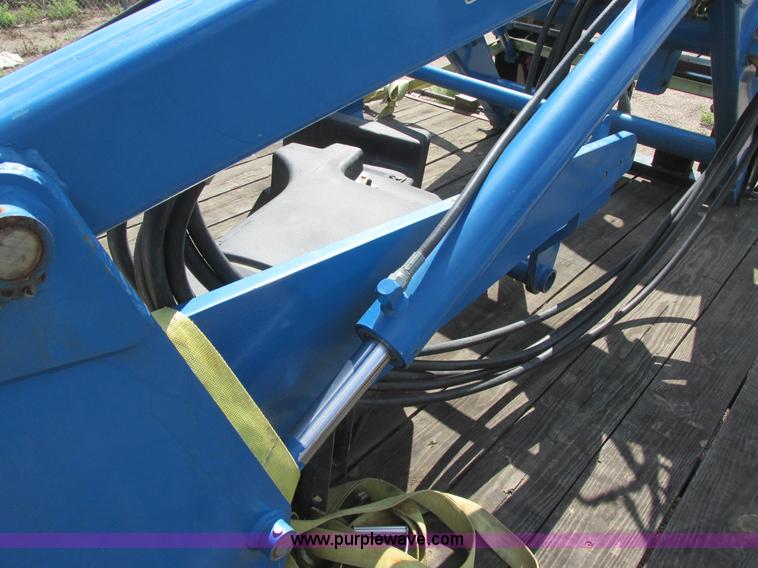 image for item I6197 1999 New Holland TS110 MFWD tractor