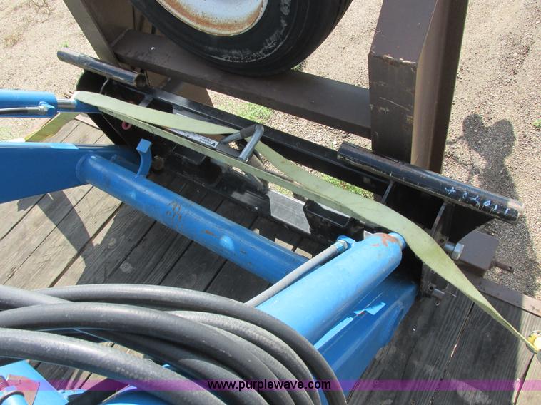 image for item I6197 1999 New Holland TS110 MFWD tractor