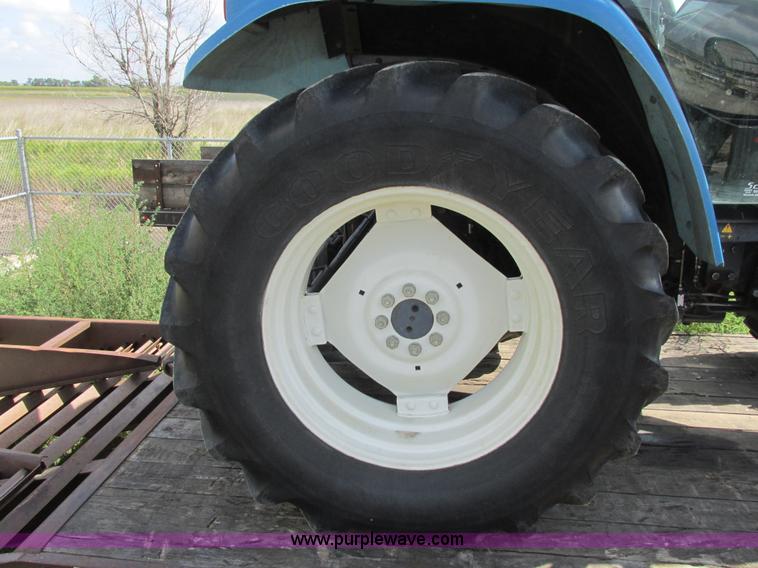 image for item I6197 1999 New Holland TS110 MFWD tractor