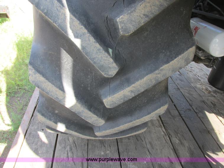 image for item I6197 1999 New Holland TS110 MFWD tractor