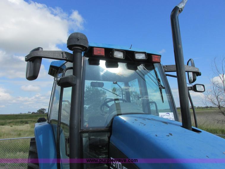image for item I6197 1999 New Holland TS110 MFWD tractor