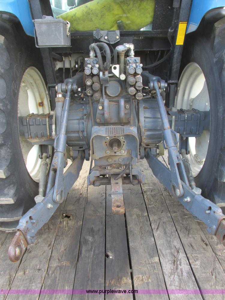 image for item I6197 1999 New Holland TS110 MFWD tractor