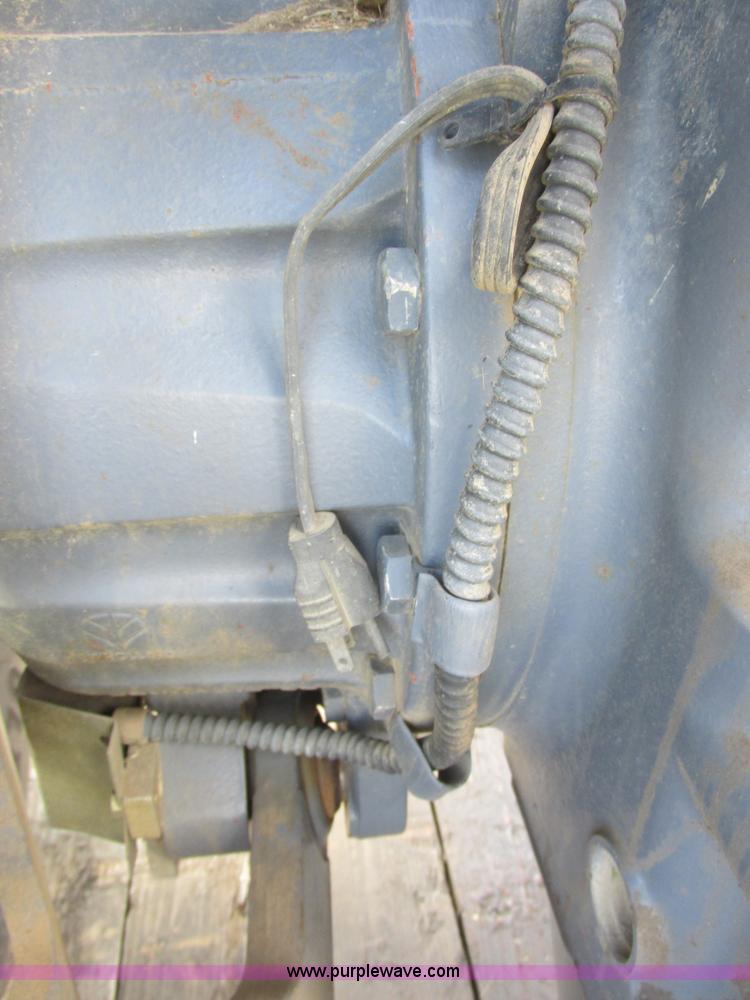 image for item I6197 1999 New Holland TS110 MFWD tractor