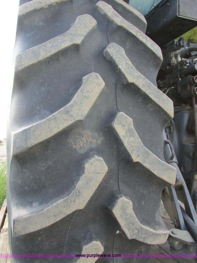 image for item I6197 1999 New Holland TS110 MFWD tractor