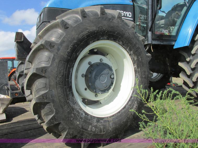 image for item I6197 1999 New Holland TS110 MFWD tractor