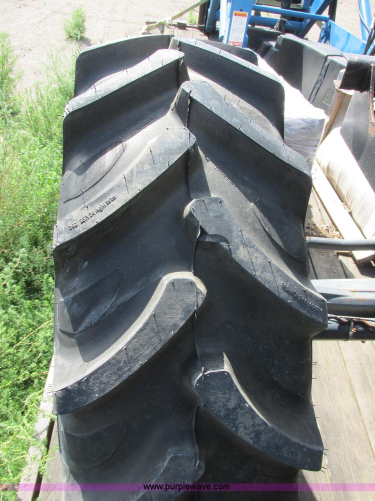 image for item I6197 1999 New Holland TS110 MFWD tractor