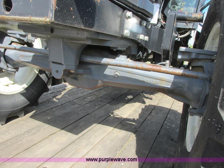 image for item I6197 1999 New Holland TS110 MFWD tractor