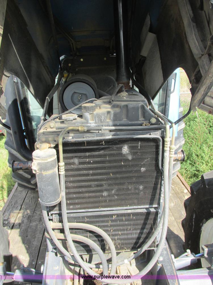 image for item I6197 1999 New Holland TS110 MFWD tractor