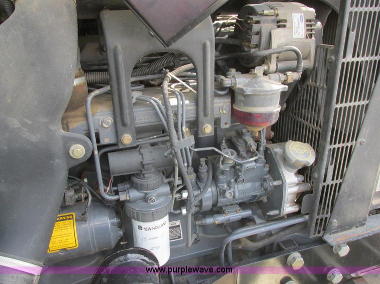 image for item I6197 1999 New Holland TS110 MFWD tractor