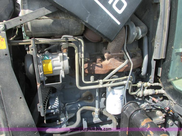 image for item I6197 1999 New Holland TS110 MFWD tractor