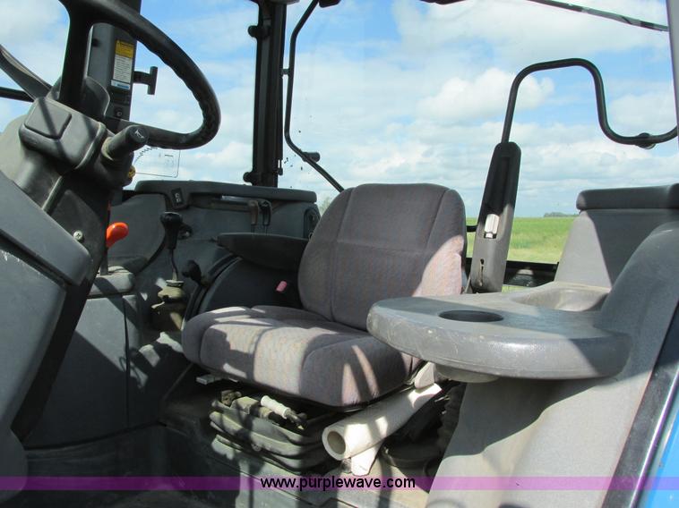 image for item I6197 1999 New Holland TS110 MFWD tractor