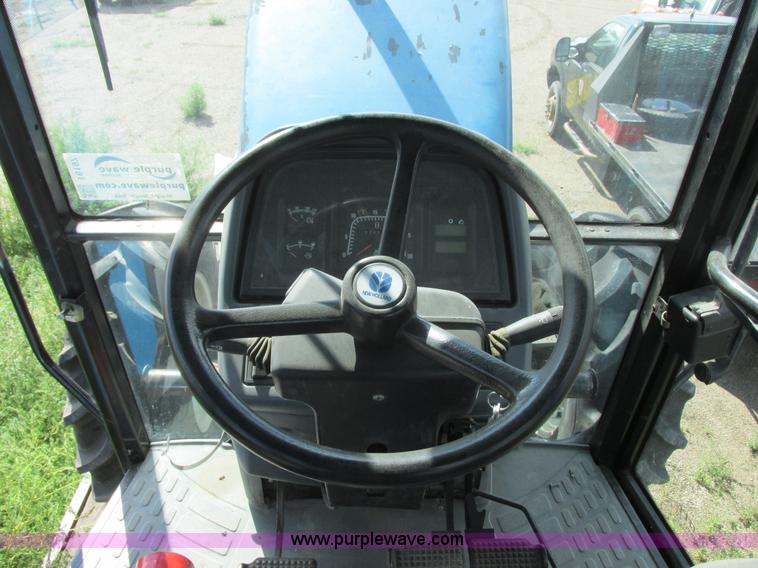 image for item I6197 1999 New Holland TS110 MFWD tractor