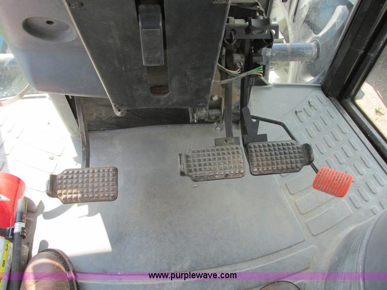 image for item I6197 1999 New Holland TS110 MFWD tractor