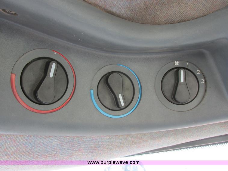 image for item I6197 1999 New Holland TS110 MFWD tractor