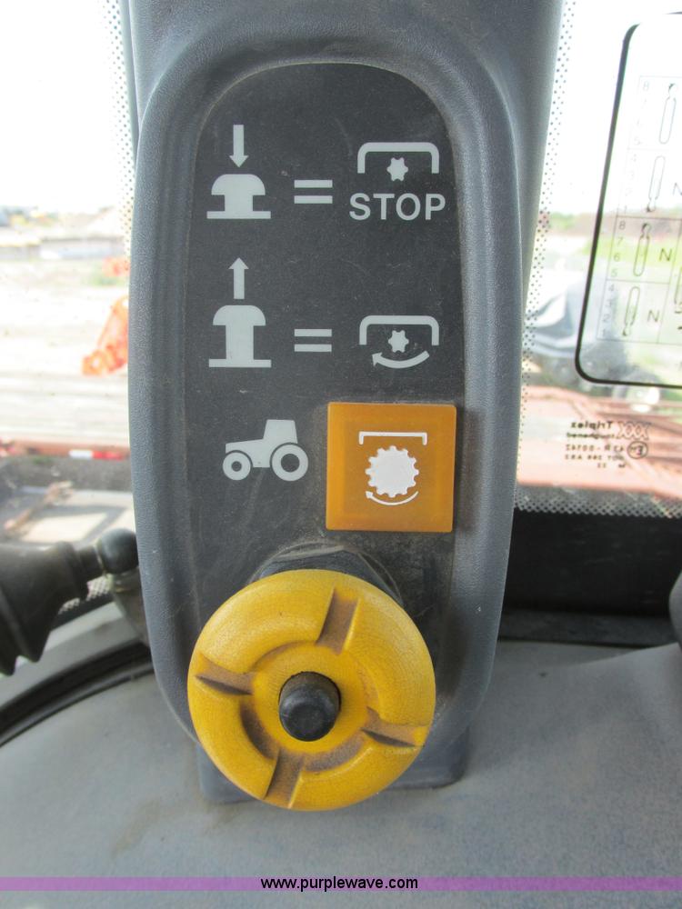 image for item I6197 1999 New Holland TS110 MFWD tractor