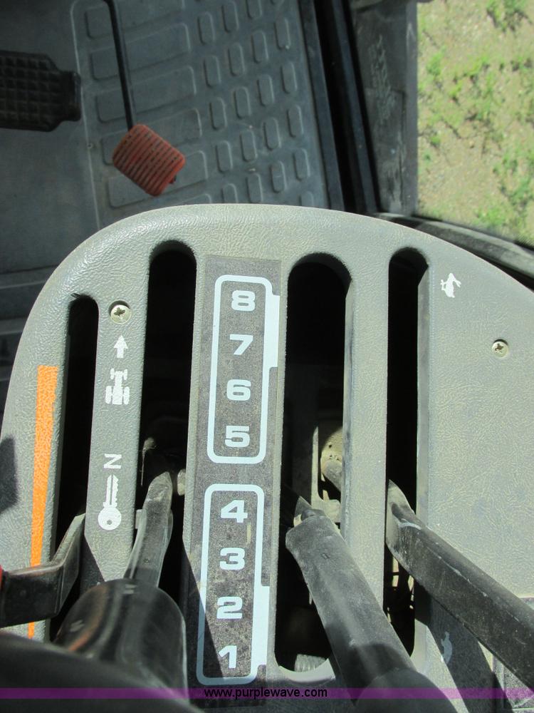 image for item I6197 1999 New Holland TS110 MFWD tractor