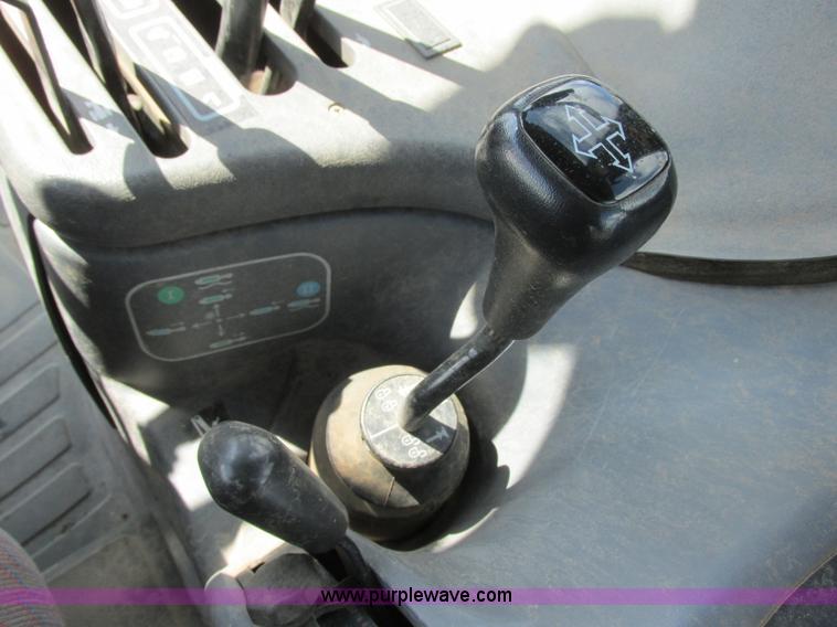 image for item I6197 1999 New Holland TS110 MFWD tractor