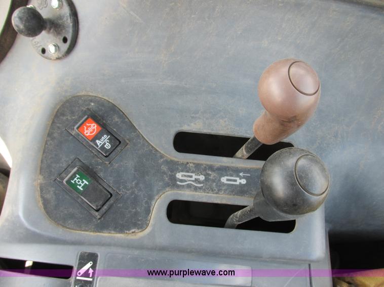 image for item I6197 1999 New Holland TS110 MFWD tractor