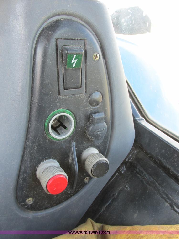 image for item I6197 1999 New Holland TS110 MFWD tractor