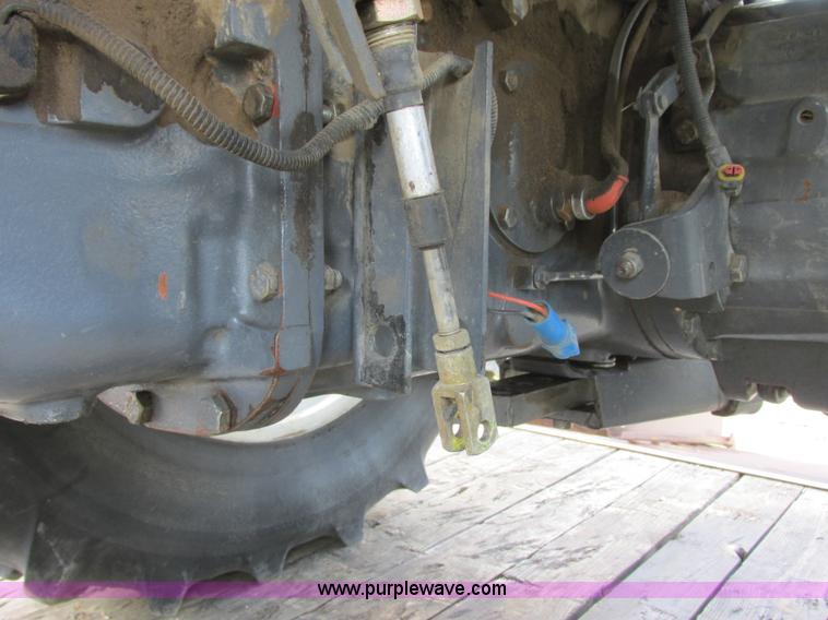 image for item I6197 1999 New Holland TS110 MFWD tractor