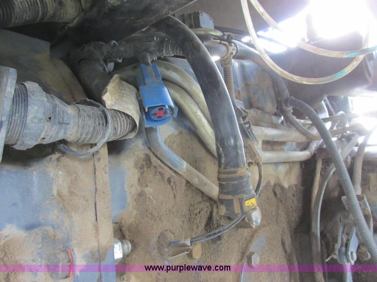 image for item I6197 1999 New Holland TS110 MFWD tractor