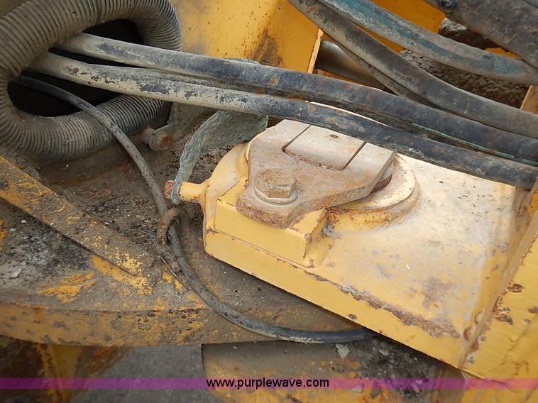 image for item I3553 1995 John Deere 770BH articulated motor grader