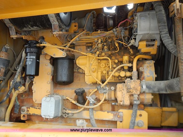 image for item I3553 1995 John Deere 770BH articulated motor grader