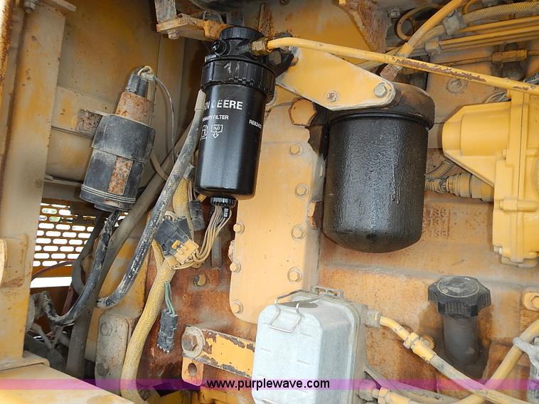 image for item I3553 1995 John Deere 770BH articulated motor grader