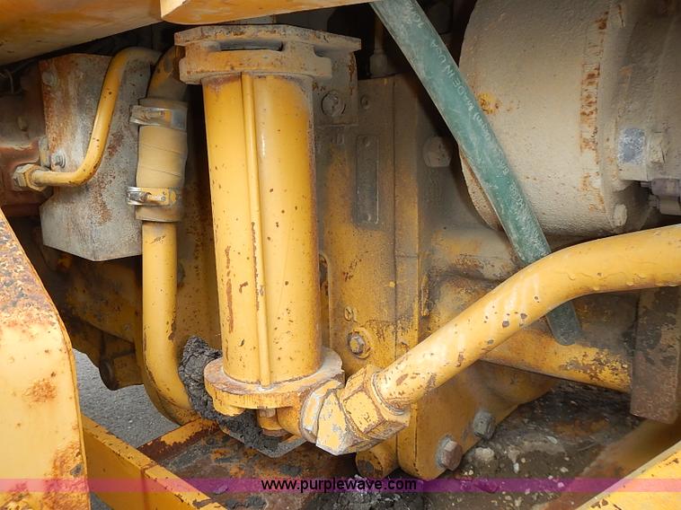 image for item I3553 1995 John Deere 770BH articulated motor grader