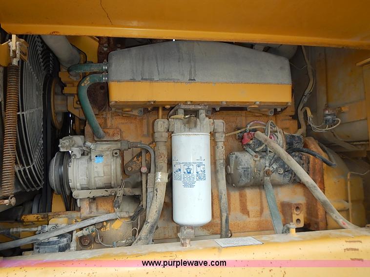 image for item I3553 1995 John Deere 770BH articulated motor grader