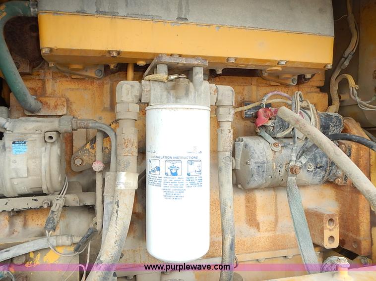 image for item I3553 1995 John Deere 770BH articulated motor grader