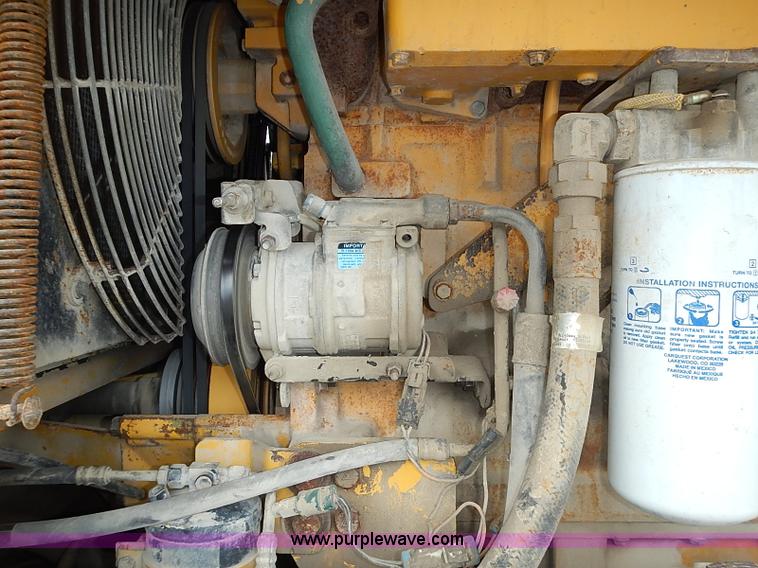 image for item I3553 1995 John Deere 770BH articulated motor grader