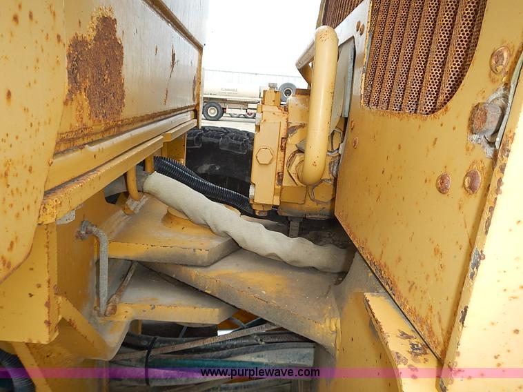 image for item I3553 1995 John Deere 770BH articulated motor grader