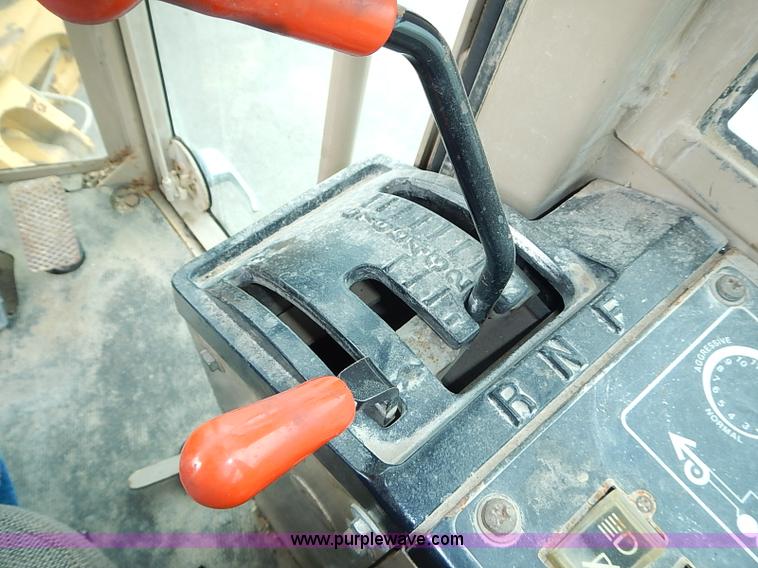 image for item I3553 1995 John Deere 770BH articulated motor grader