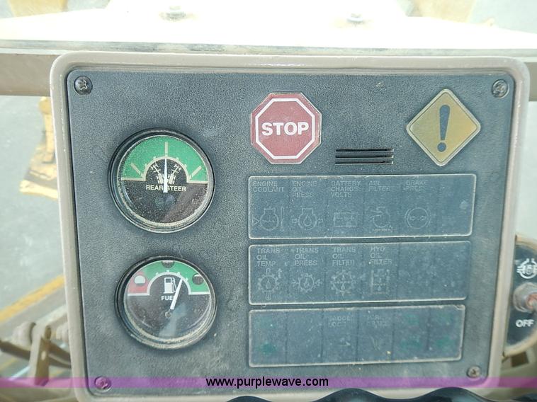 image for item I3553 1995 John Deere 770BH articulated motor grader