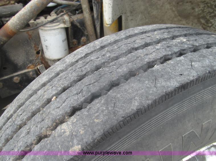 image for item I8975 1998 Freightliner FL70 dump truck