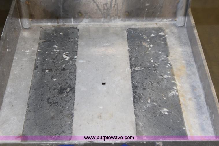 image for item J1045 2008 Genie AWP40S man lift