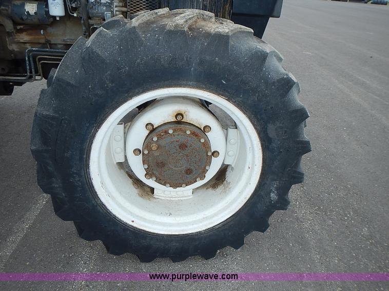 image for item J3167 1998 New Holland 7740 tractor