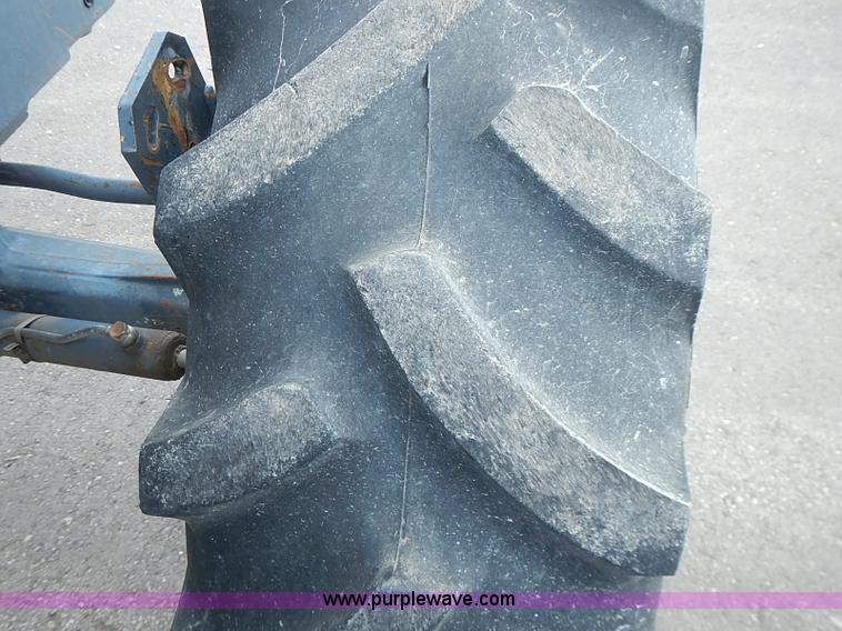 image for item J3167 1998 New Holland 7740 tractor