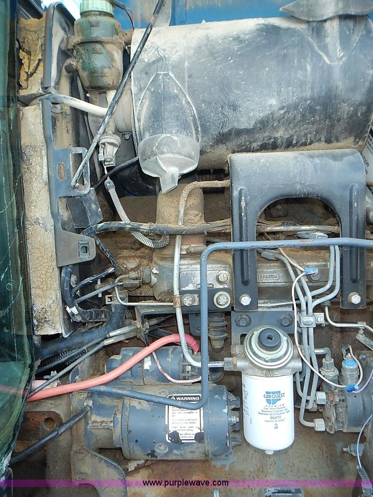 image for item J3167 1998 New Holland 7740 tractor