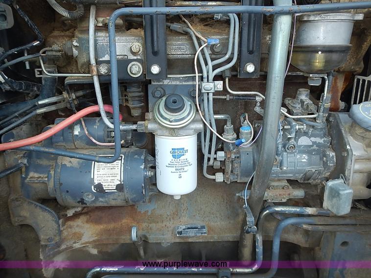 image for item J3167 1998 New Holland 7740 tractor