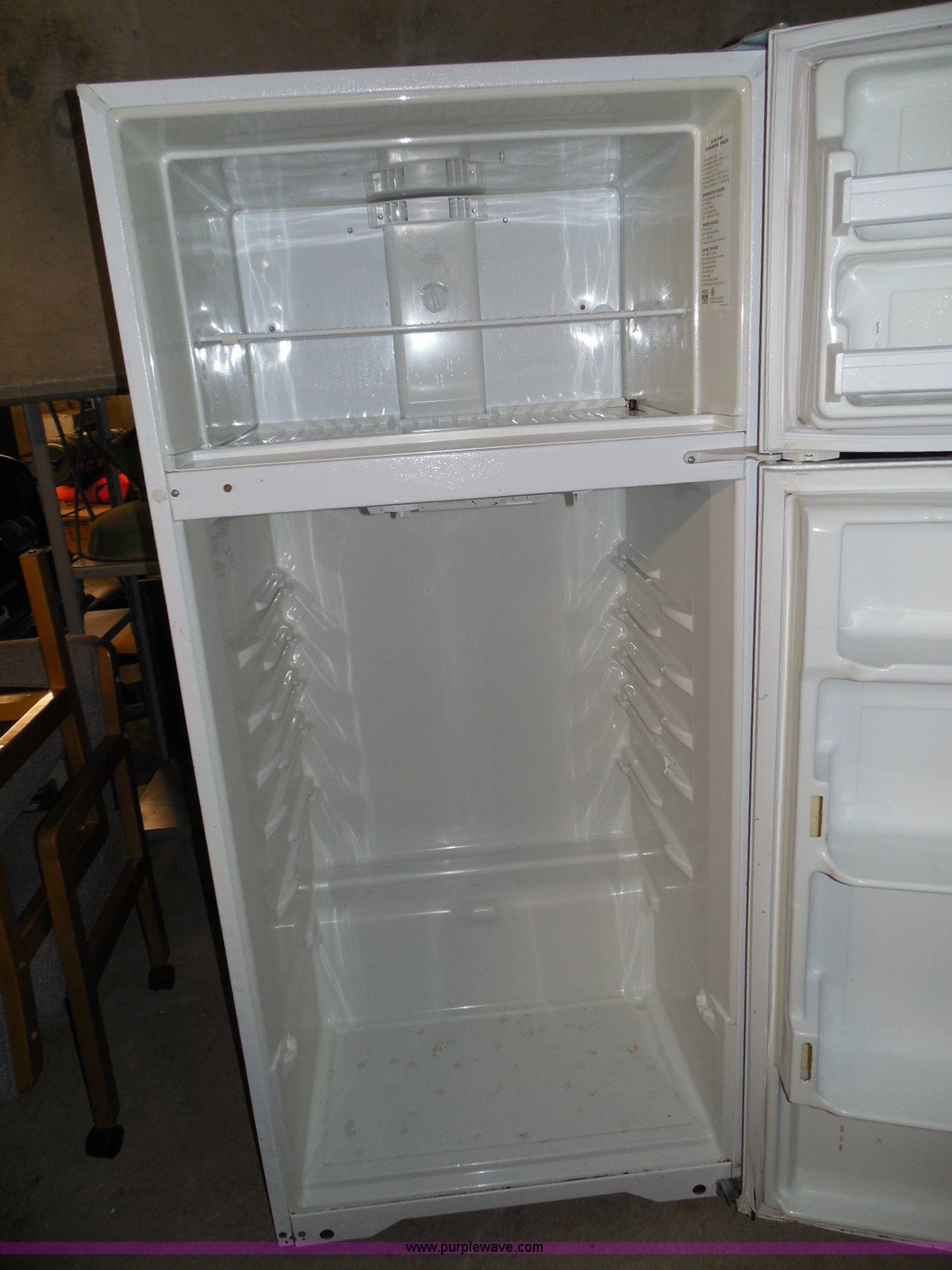 White Kelvinator refrigerator with top frostless freezer in Wichita, KS