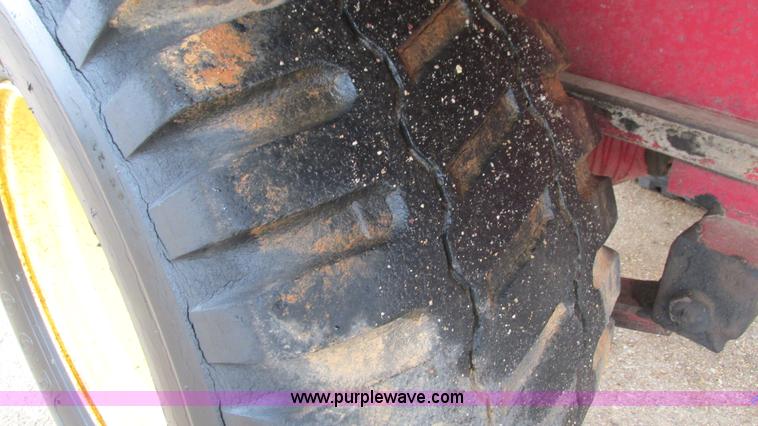 image for item I3248 New Holland 1049 Stackcruiser self-propelled bale wagon