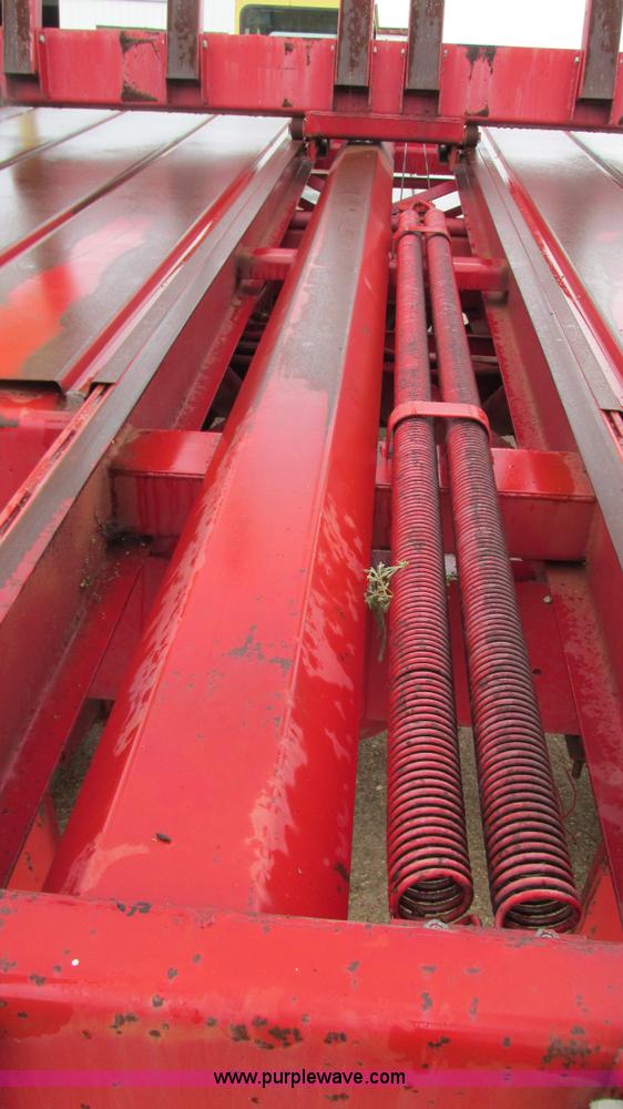 image for item I3248 New Holland 1049 Stackcruiser self-propelled bale wagon