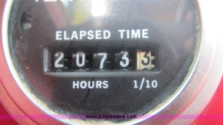 image for item I3248 New Holland 1049 Stackcruiser self-propelled bale wagon